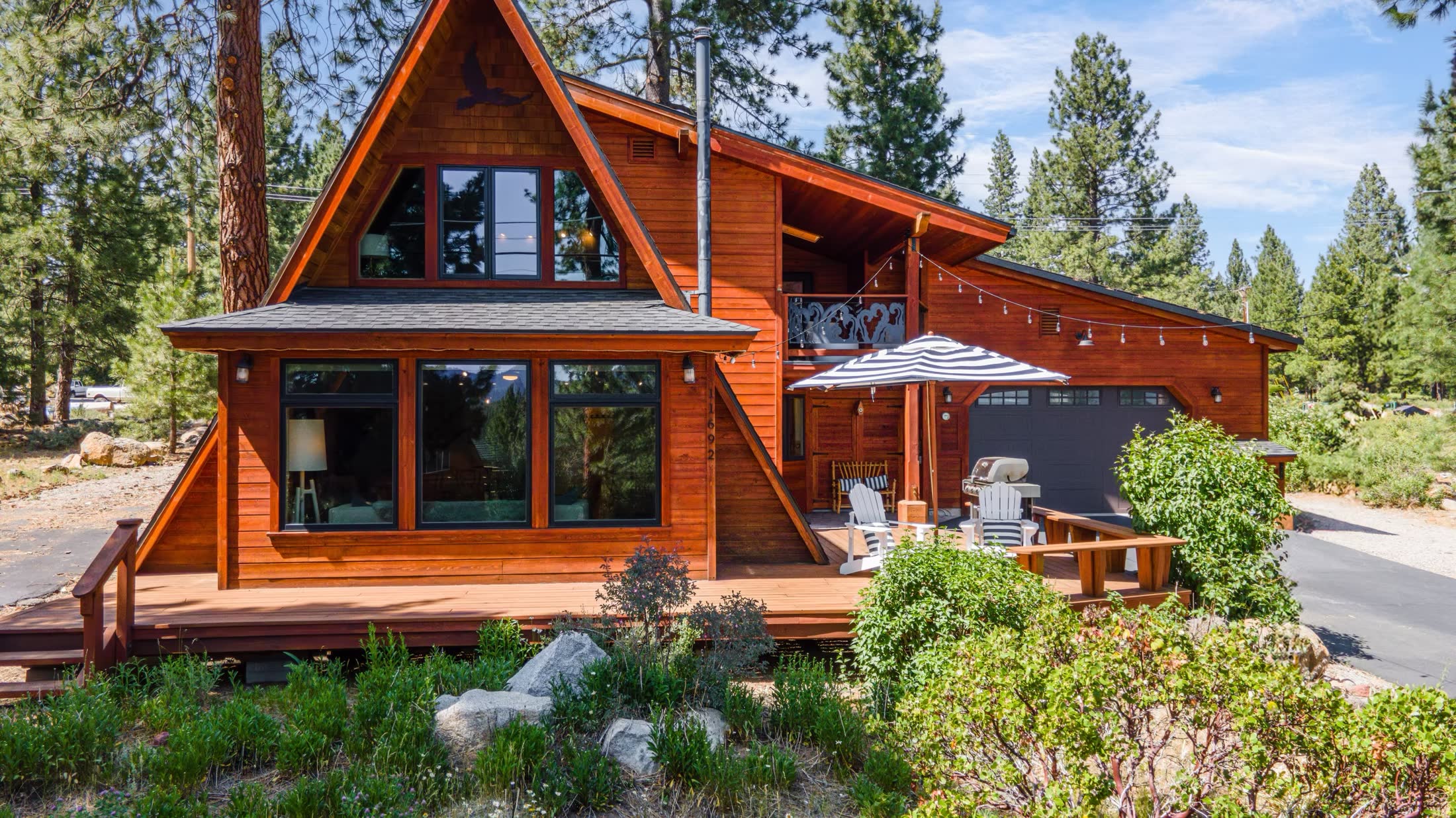 The A-frame and its deck on a sunny summer day