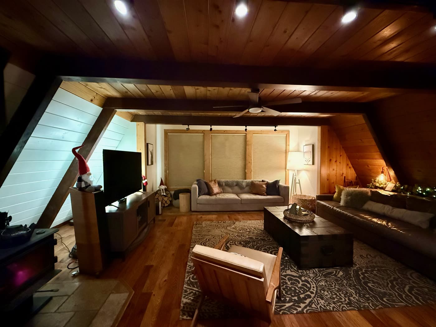 The cozy media room with a big sectional
